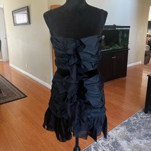 Dolce & Gabbana black ruffle mini dress as seen on Amy Winehouse